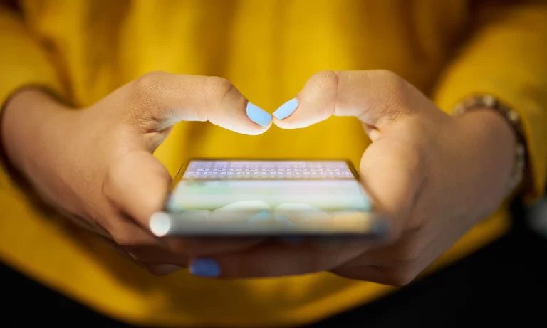 mobile-phone-cradled-in-womans-hands